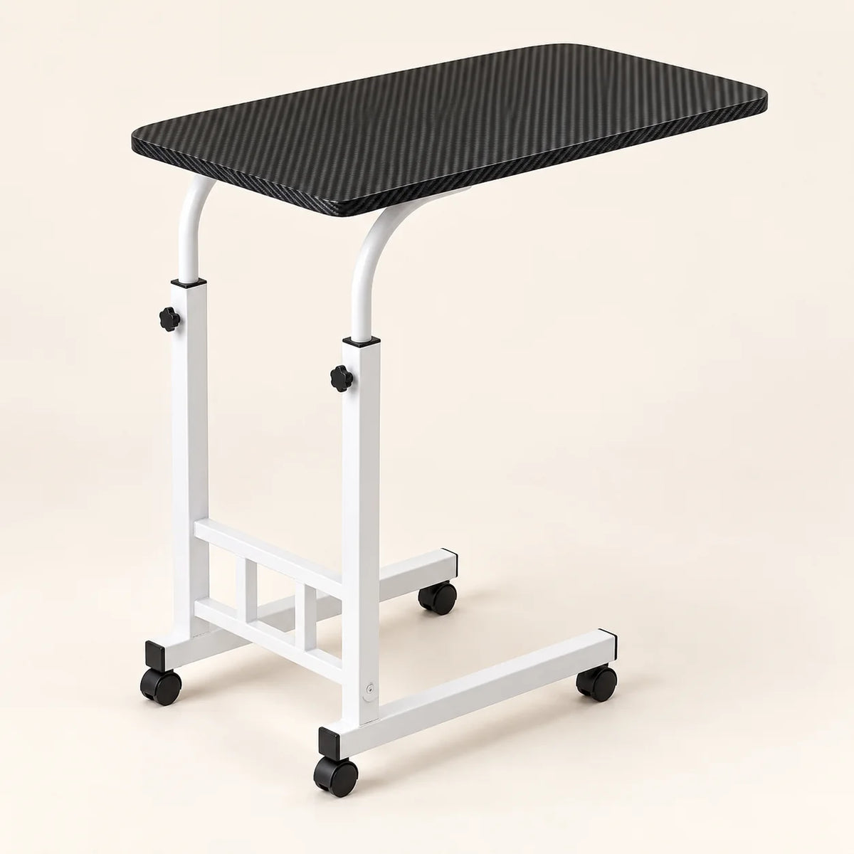 Black ribbed rolling bedside table with white adjustable frame on a neutral studio background